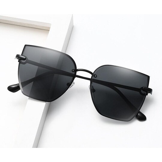 Polariserte solbriller med smale rammer, svart - Elkjøp
