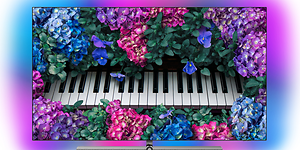 Phillips OLED+ med keyboard og blomster